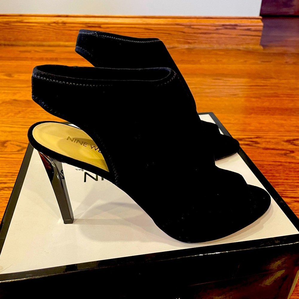 Size 9.5 Nine West Black suede open toed heels.